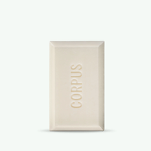  Corpus Nº Green Cleansing Bar. Features a blend of Bergamot, Pink Lemon, Orange Blossom, and Cardamom scents in a sleek, rectangular bar. 6 oz.