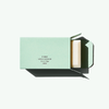 Nº Green Cleansing Bar: combines Bergamot, Pink Lemon, Orange Blossom, and Cardamom scents in a sleek, rectangular bar. 6 oz