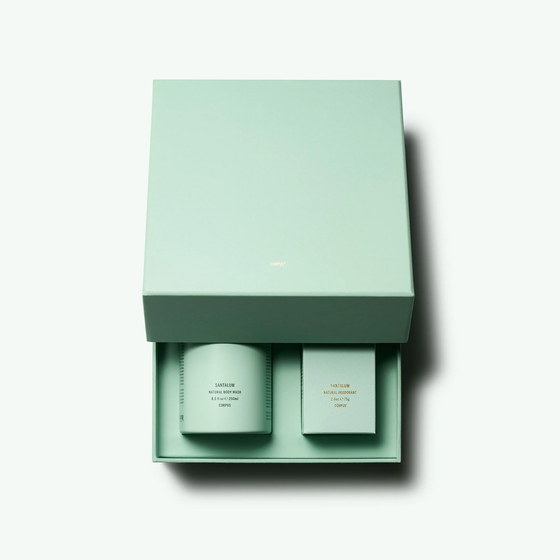 Corpus Santalum Duo Kit. Includes full-size Deodorant Stick and Body Wash in the Santalum scent, packaged in a custom green gift box with the Corpus logo.