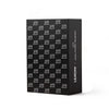 Lexon x Jean-Michel Basquiat gift set with iconic “Crown” artwork in black. Features speaker and clock in minimalist packaging that honors the artist’s legendary motif.