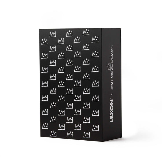 Lexon x Jean-Michel Basquiat gift set with iconic “Crown” artwork in black. Features speaker and clock in minimalist packaging that honors the artist’s legendary motif.