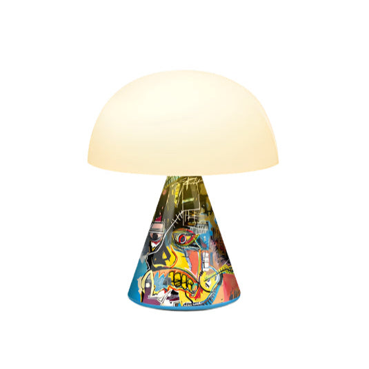 Lexon MINA M LED lamp wrapped in Jean-Michel Basquiat’s Untitled (Skull), turning home lighting into a powerful, emotional art installation.
