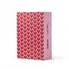 Lexon gift set in pink featuring Keith Haring’s “Heart” design, including portable speaker and accessories. A stylish holiday gift for tech and art fans.