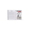 Open interior view of the Lexon x Keith Haring love white gift set showing speaker and clock arranged inside custom box lining.