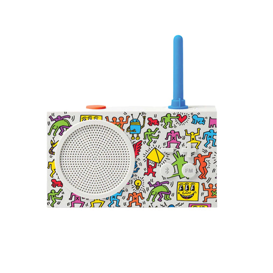Lexon TYKHO 3 in white featuring Keith Haring’s “Happy” artwork. Retro radio and Bluetooth speaker redesigned with joyful pop-art to brighten everyday listening.