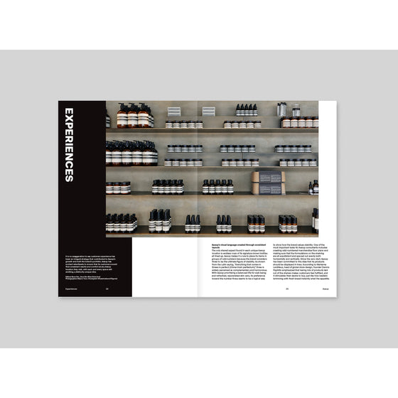 Magazine B - Issue 16 Aesop. A page featuring a neatly organized shelf of Aesop products, showcasing their range and elegant presentation.