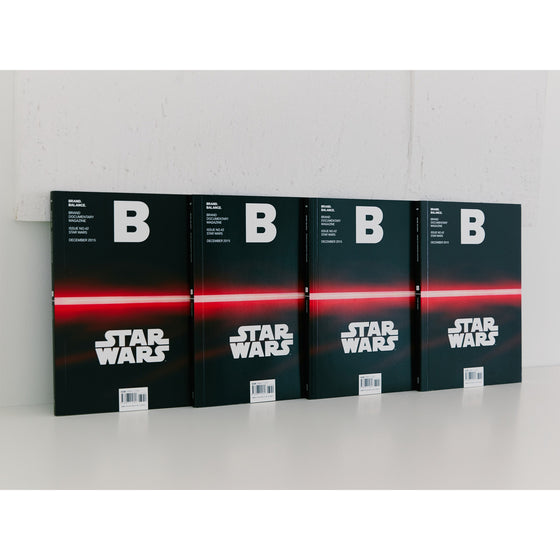 Magazine B - Issue 42 Star Wars. Four Star Wars books are lined up neatly, showcasing their distinct covers and spines, reflecting the series' extensive lore and visual appeal.