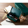 Toyo Steel T-190 Antique Green. Open view with various small items inside the box, highlighting its matte antique green finish and compact design. 0.4kg.