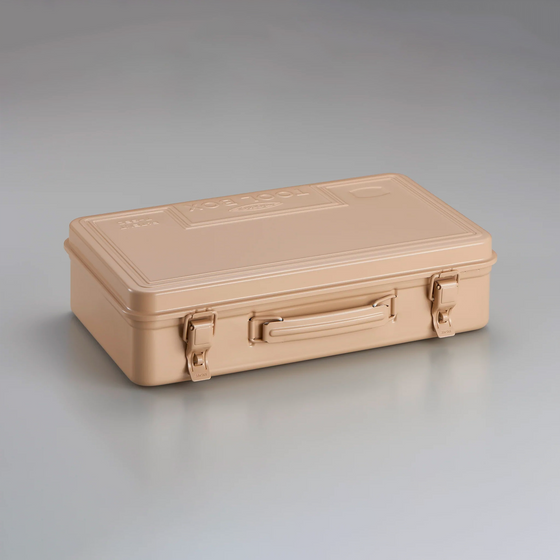 Toyo Steel T-360 Beige. Glossy beige steel toolbox, pressed from a single plate with a round handle and no sharp edges. Durable, stackable, and features a cylinder lock. 1.6kg.