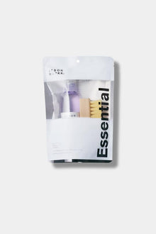  Jason Markk Essential Kit. Front of the Essential Kit packaging showcasing the Premium Deep Cleaning Solution and Standard Cleaning Brush.